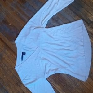 It's a long sleeve shirt it's a lil cropped in the front